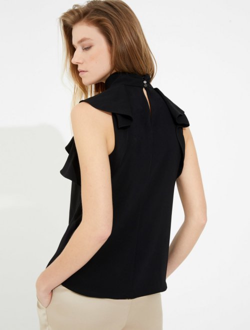 MOCK NECK TOP WITH FLOUNCE DETAIL