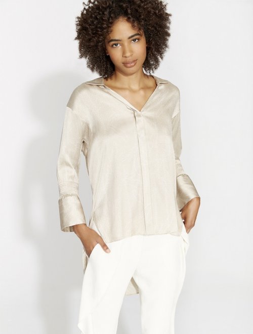 BLUSA CON PUÑOS IMPRESOS